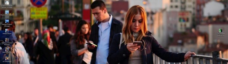 cropped-dna-banner-you-man-woman-in-town-looking-down-at-smartphone1.jpg